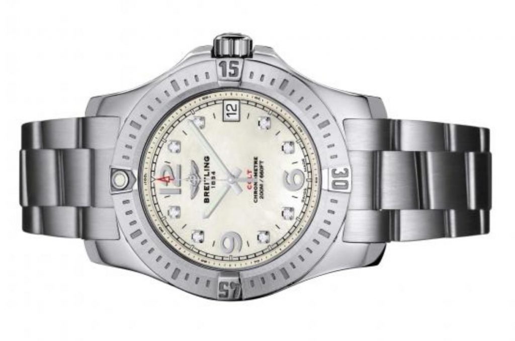 The white dial fake watch has 8 diamond hour marks.